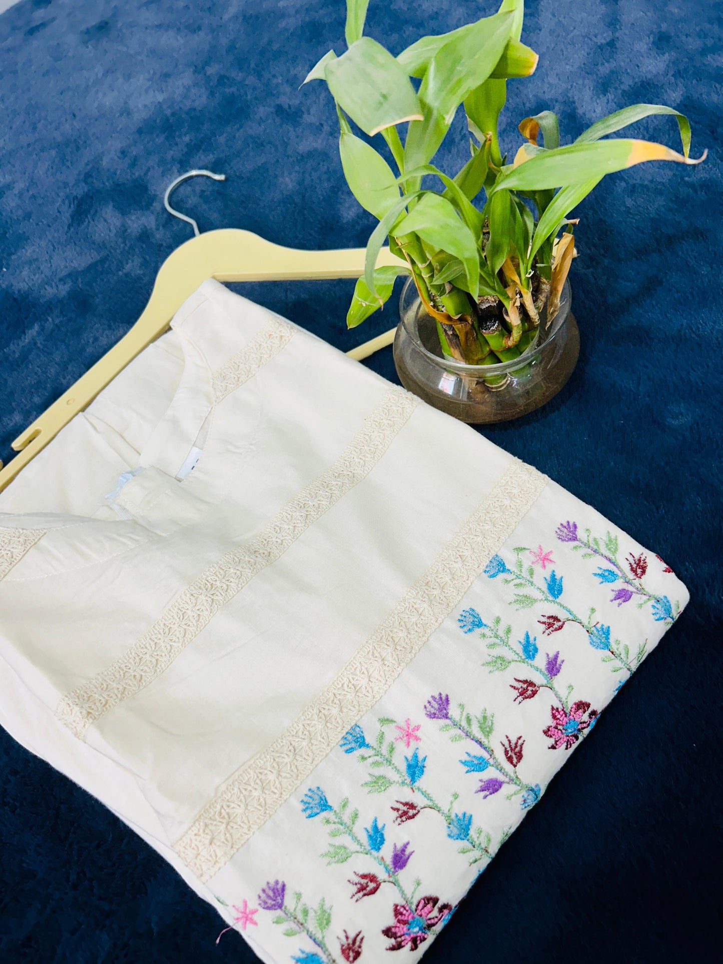 off-white flex cotton dress with floral embroidery and crochet lace detailing on yoke and sleeves