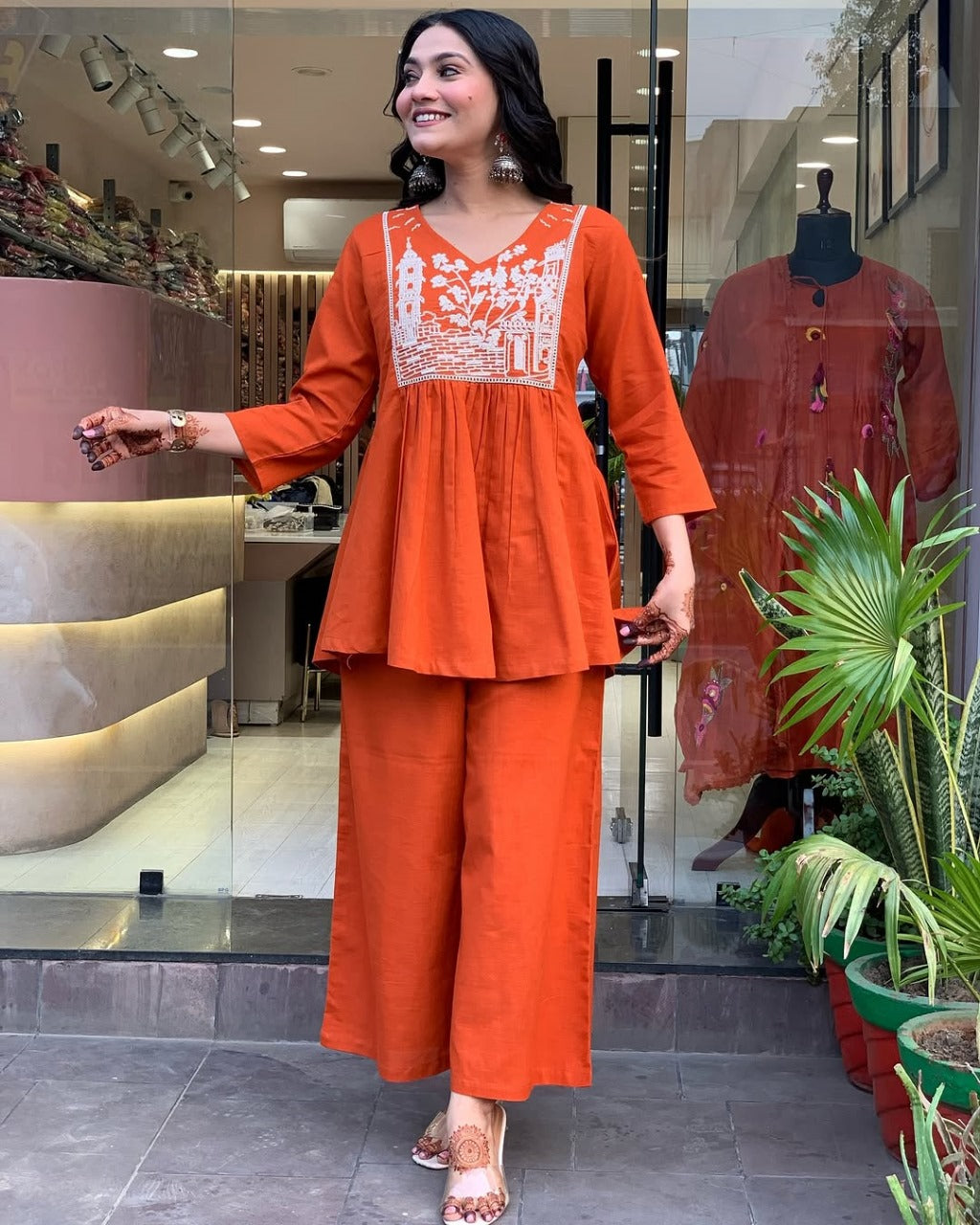 reddish orange embroidered cotton slub kurta and pant set