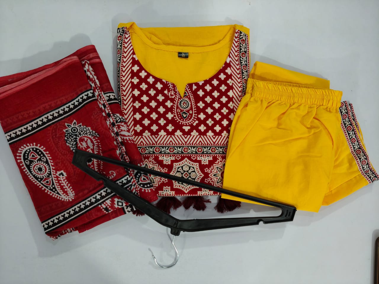traditional mustard yellow kurta set with ajrak dupatta