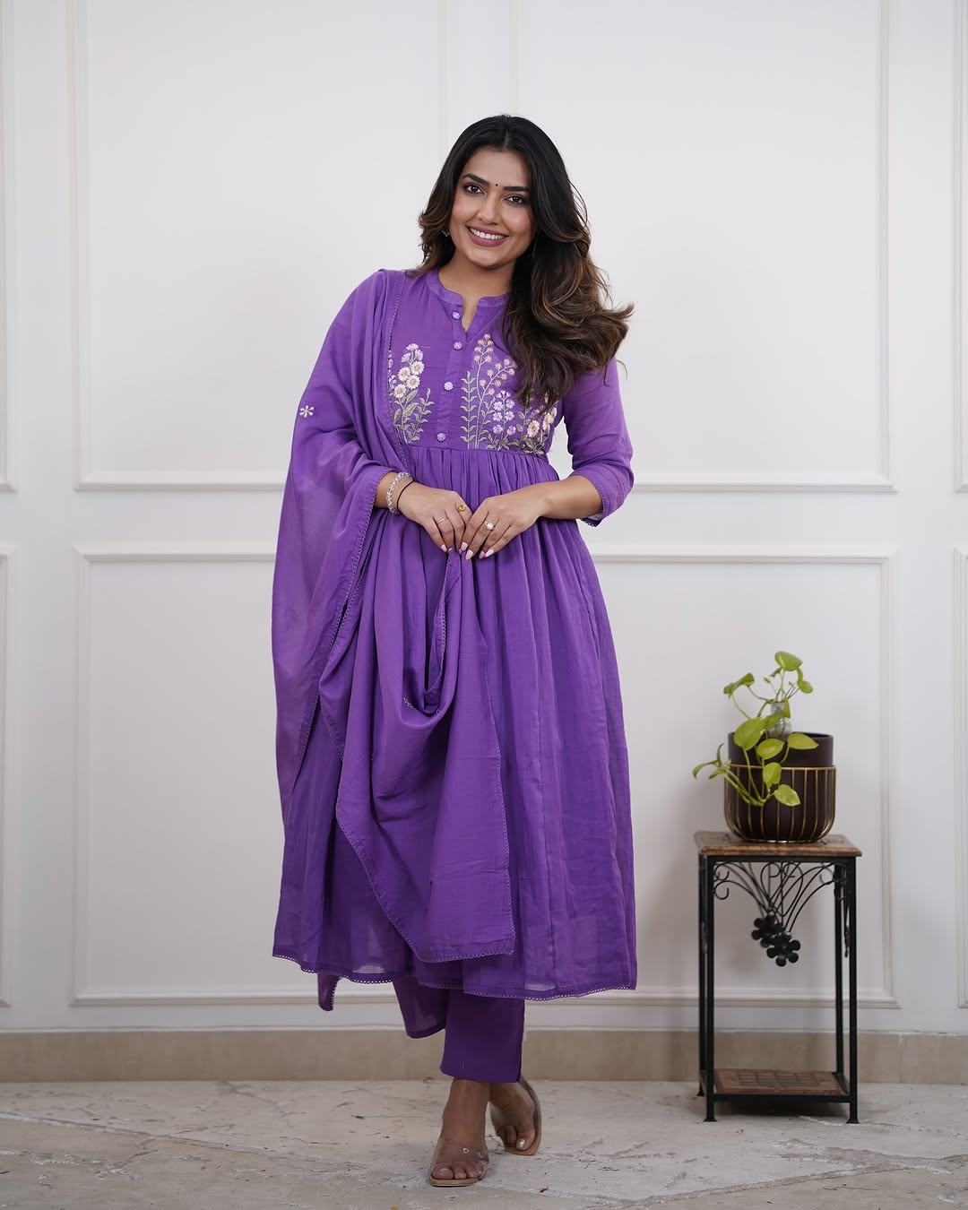 graceful purple anarkali suit with subtle floral embroidery
