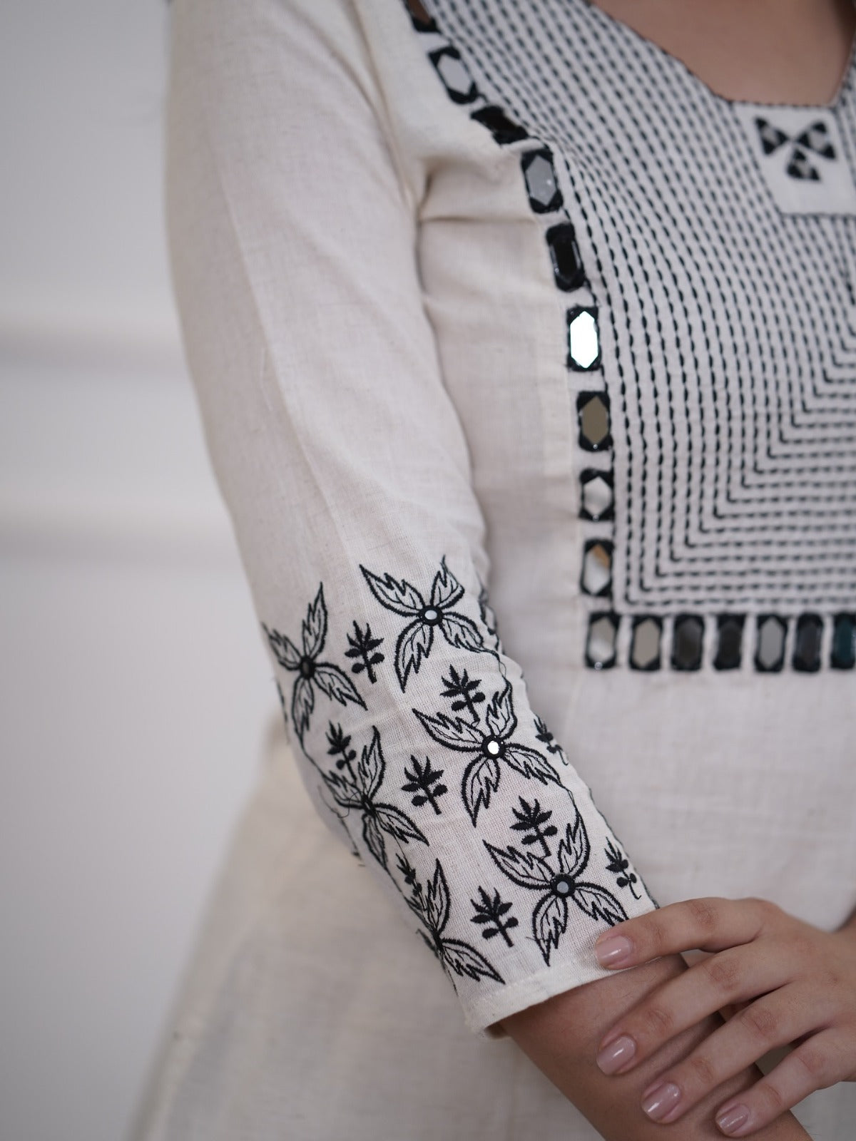 off-white embroidered floral & geometric kurta and pant set